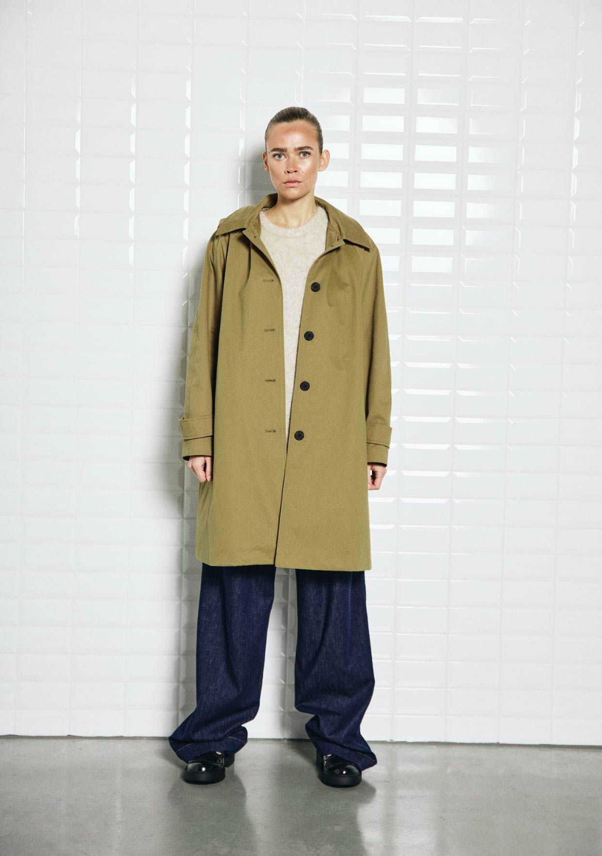 WITH BLACK TRENCHCOAT