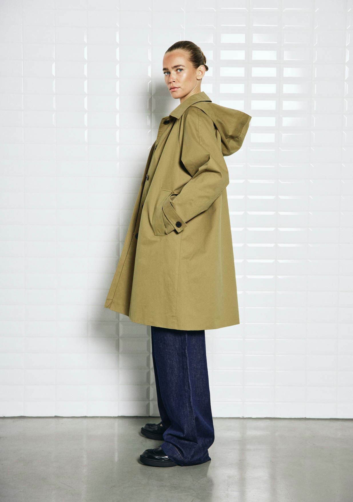 WITH BLACK TRENCHCOAT