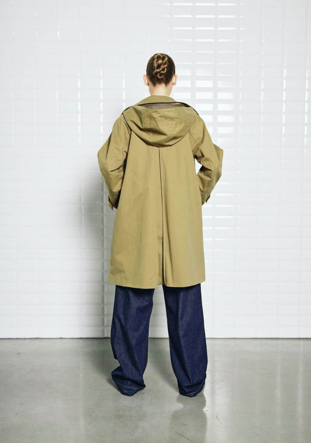 WITH BLACK TRENCHCOAT