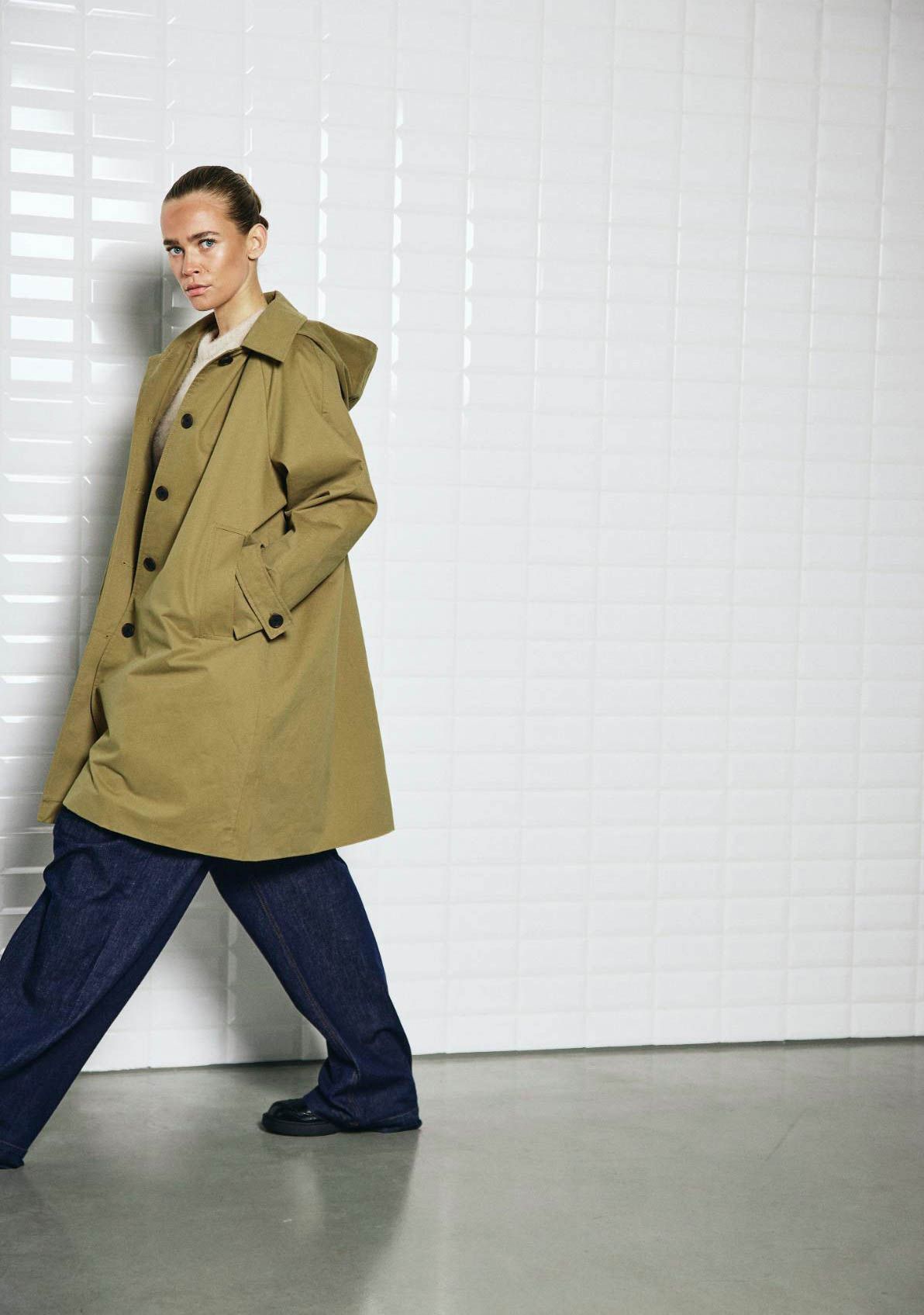 WITH BLACK TRENCHCOAT