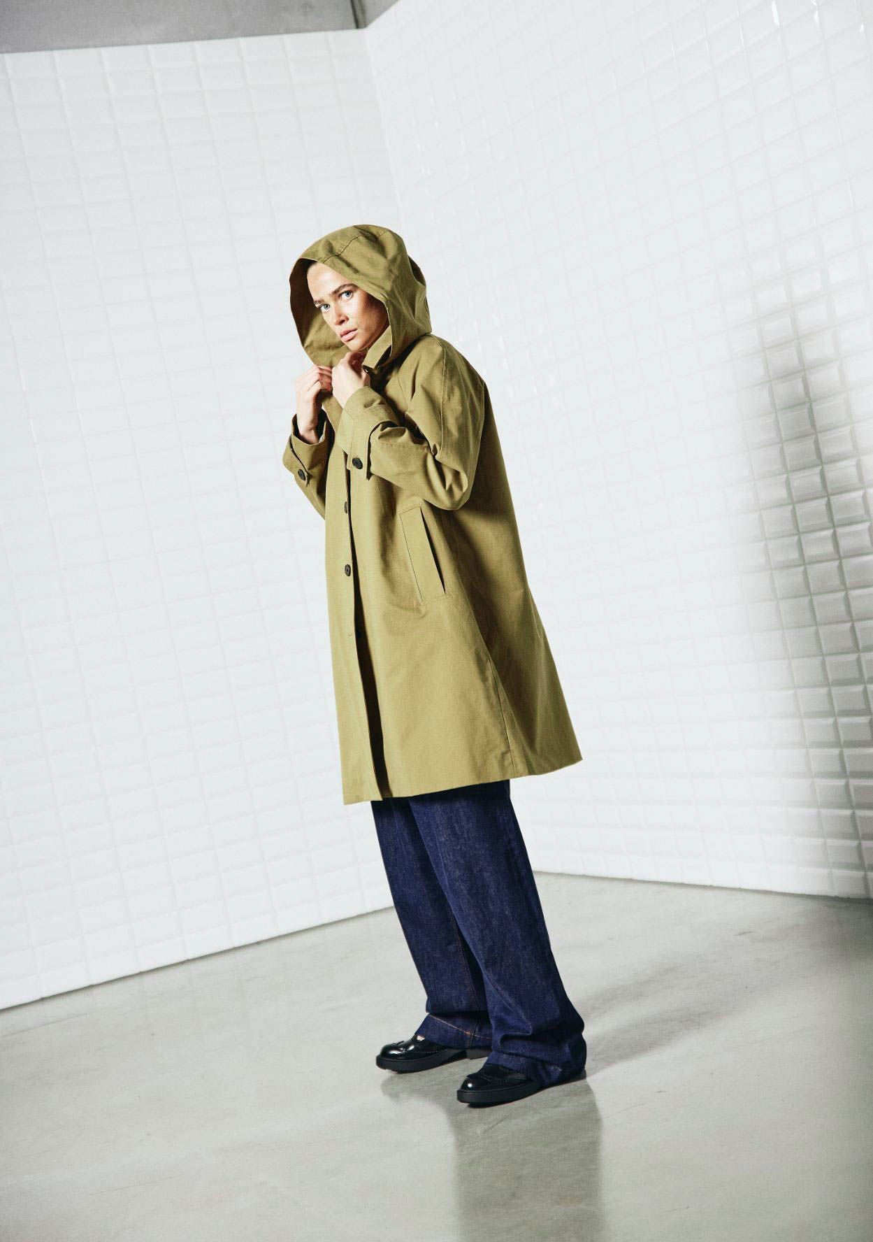 WITH BLACK TRENCHCOAT