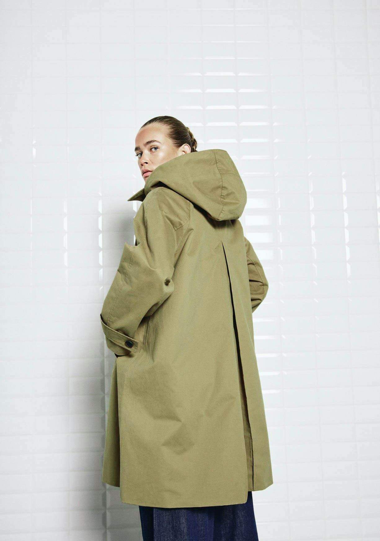 WITH BLACK TRENCHCOAT