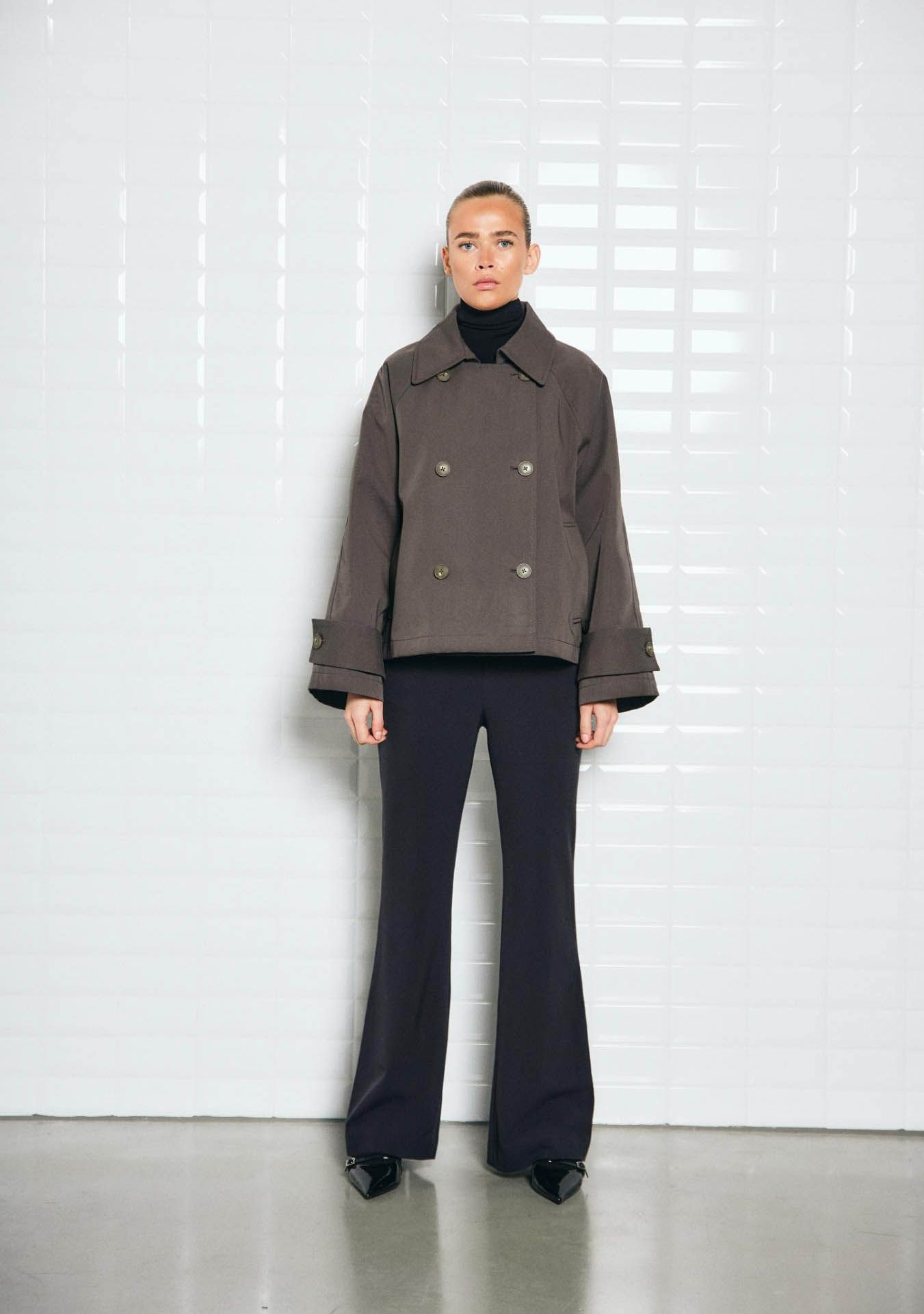 WITH BLACK TRENCHCOAT