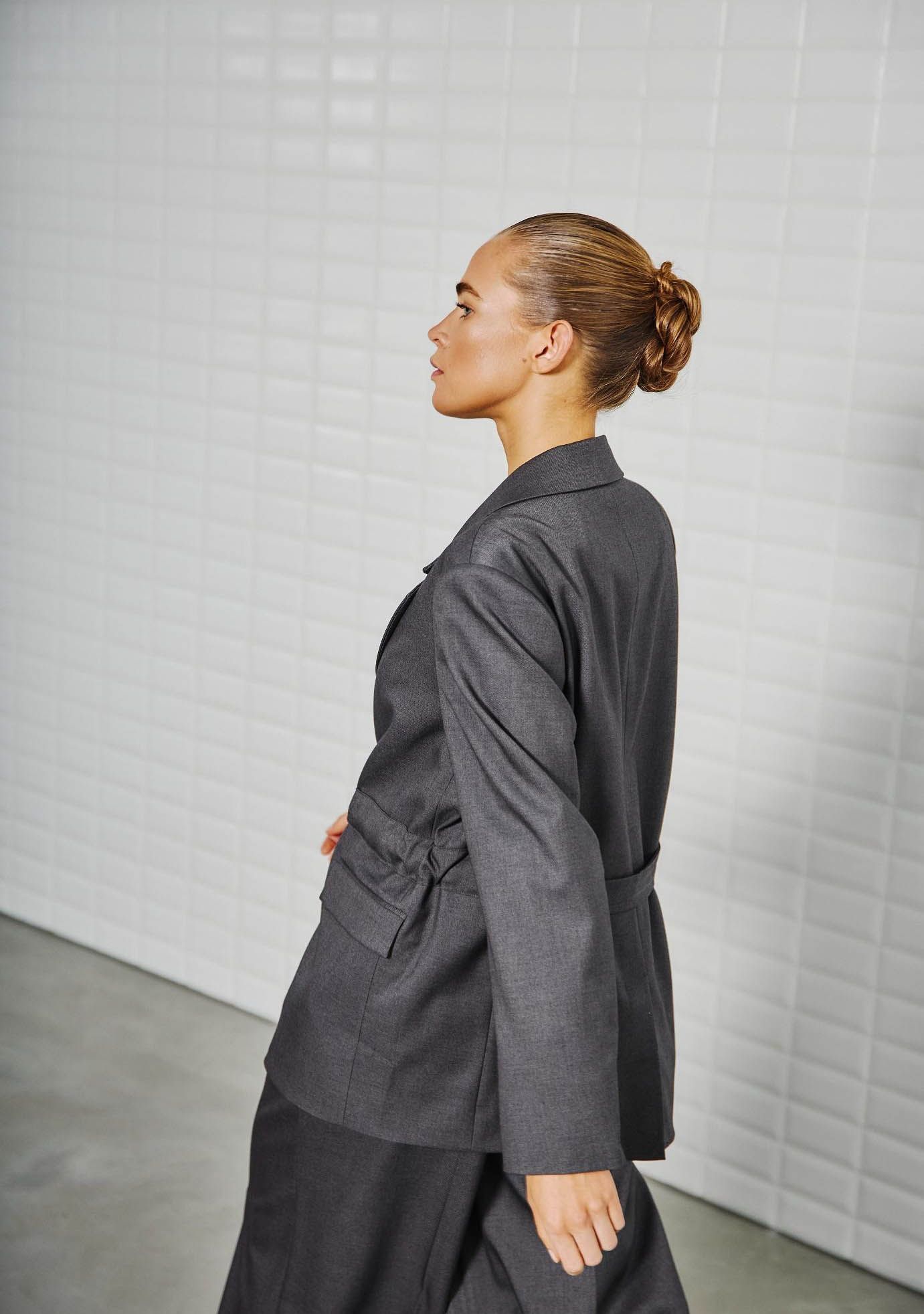 WITH BLACK BLAZER