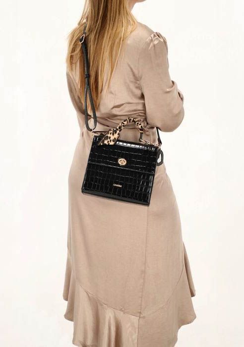 CHARM TAS