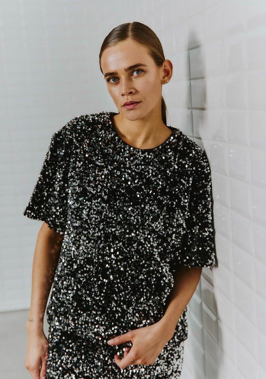 WITH BLACK BLOUSE