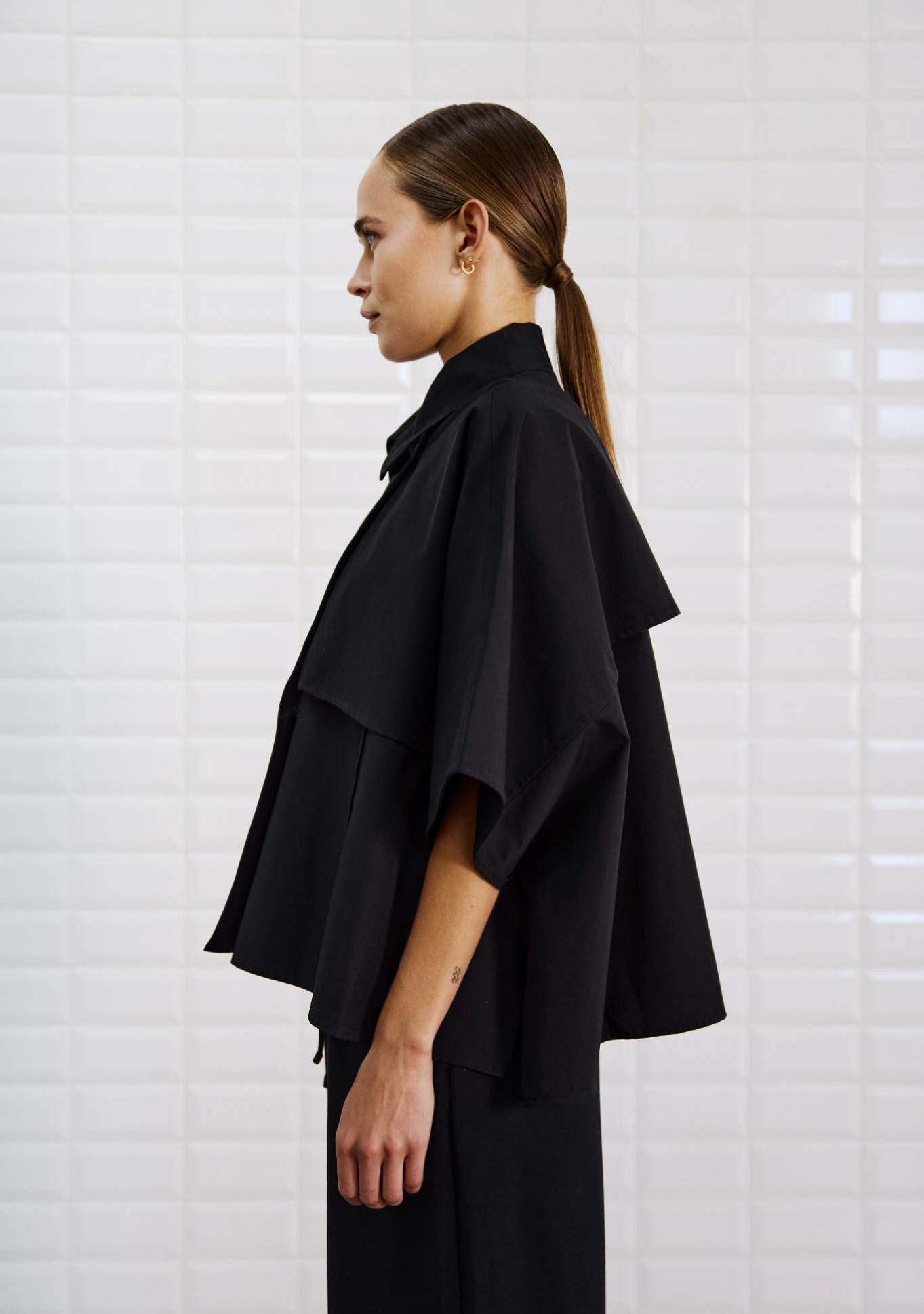 WITH BLACK TRENCHCOAT