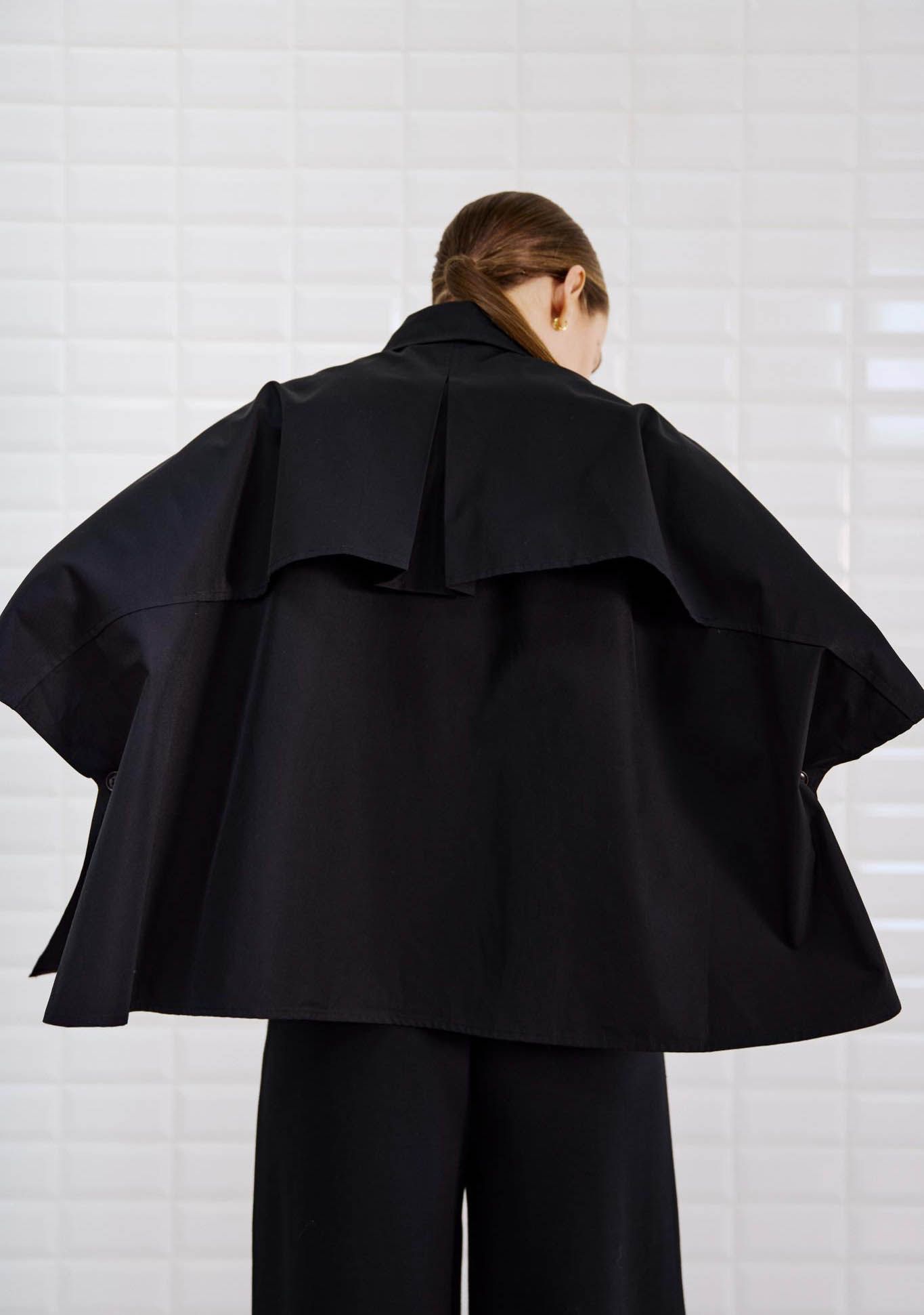 WITH BLACK TRENCHCOAT