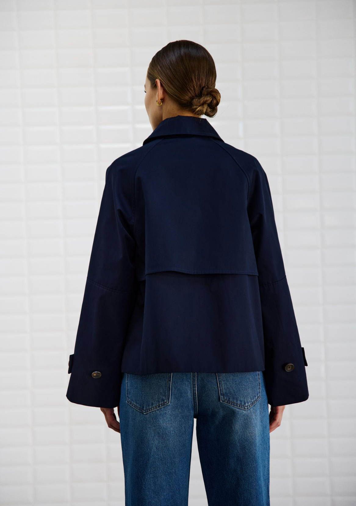 WITH BLACK TRENCHCOAT