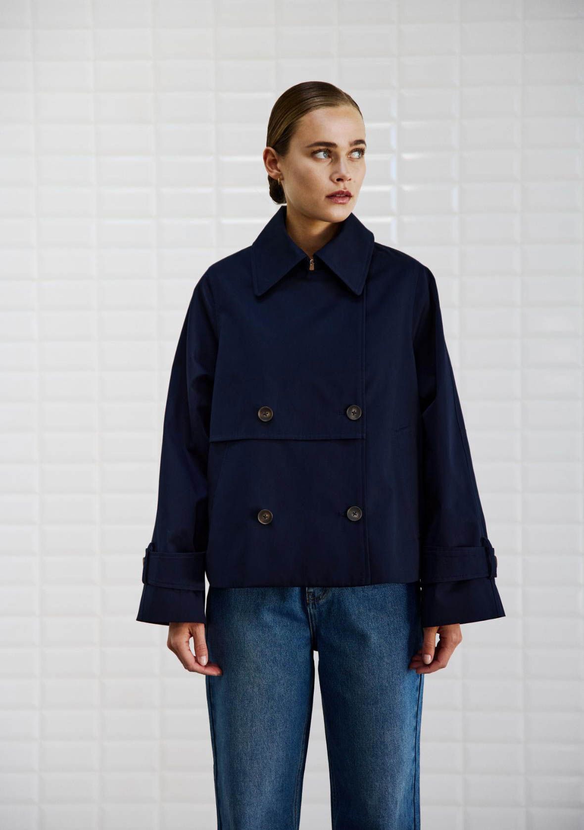 WITH BLACK TRENCHCOAT