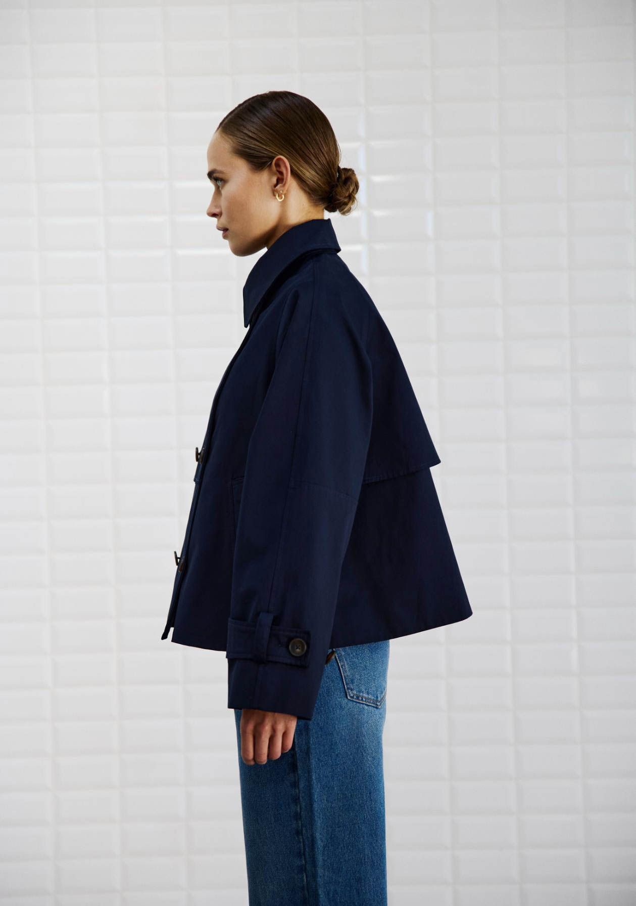 WITH BLACK TRENCHCOAT