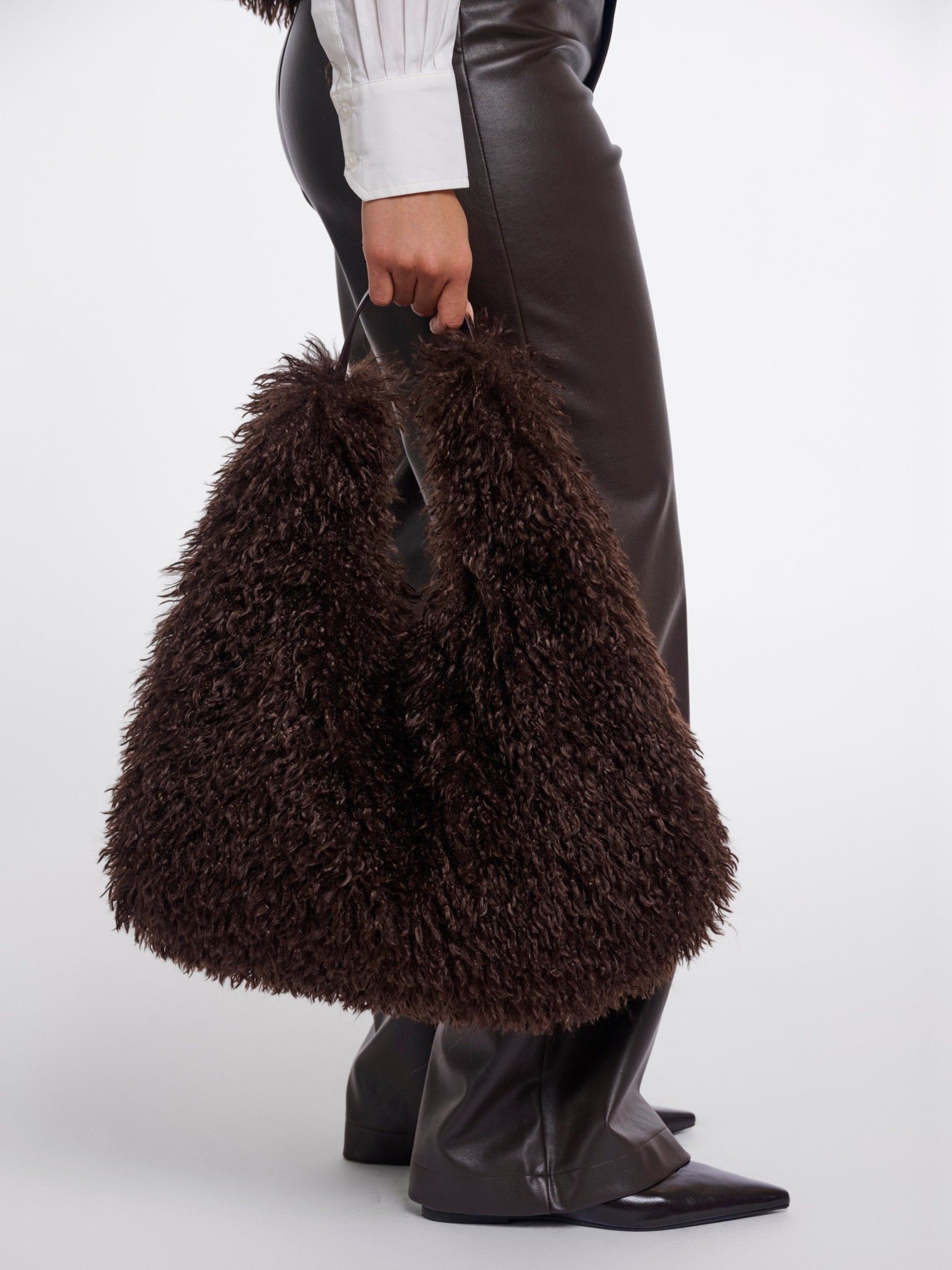 RINO EN PELLE - TAS - Bruin