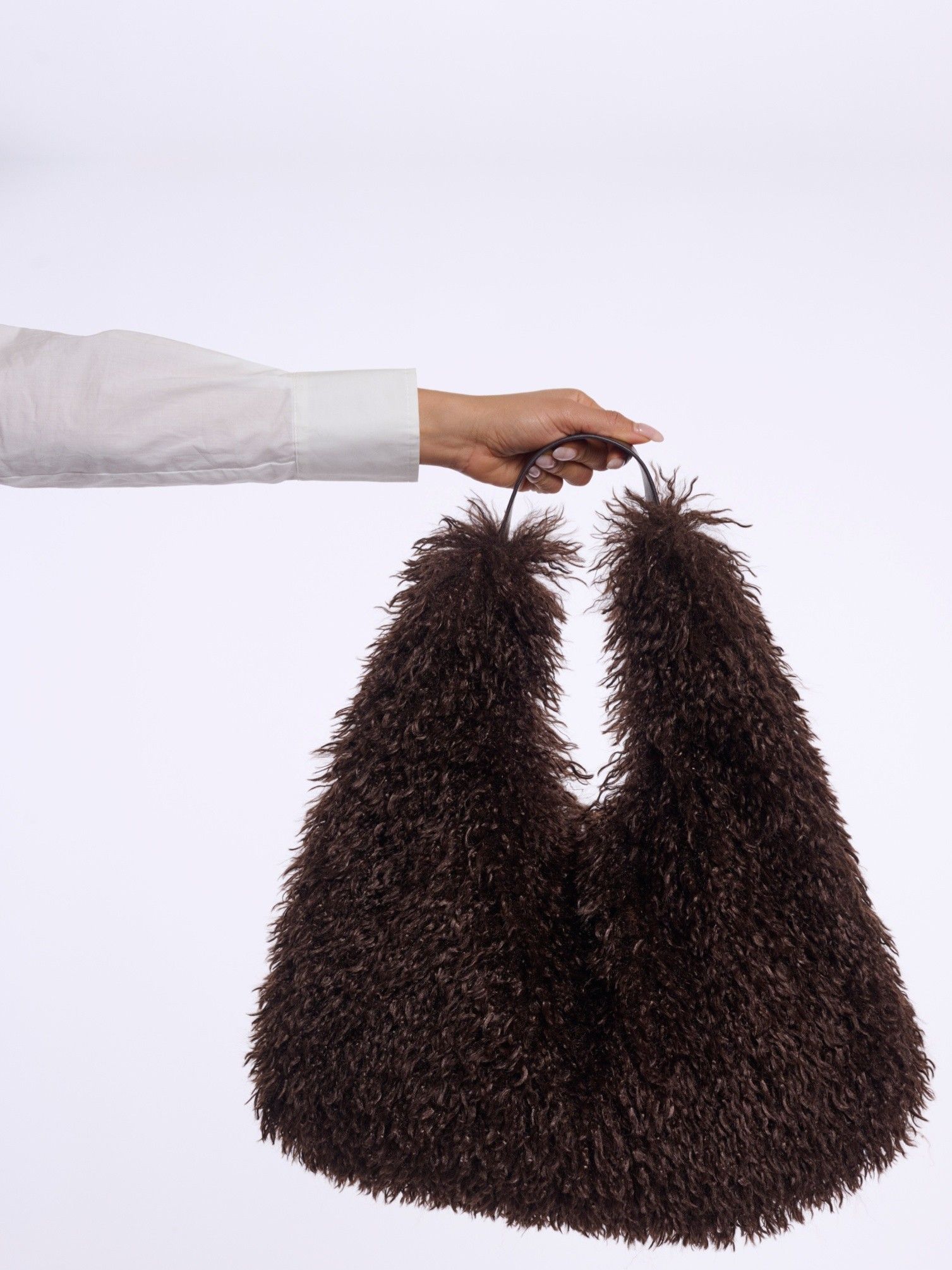 RINO EN PELLE - TAS - Bruin